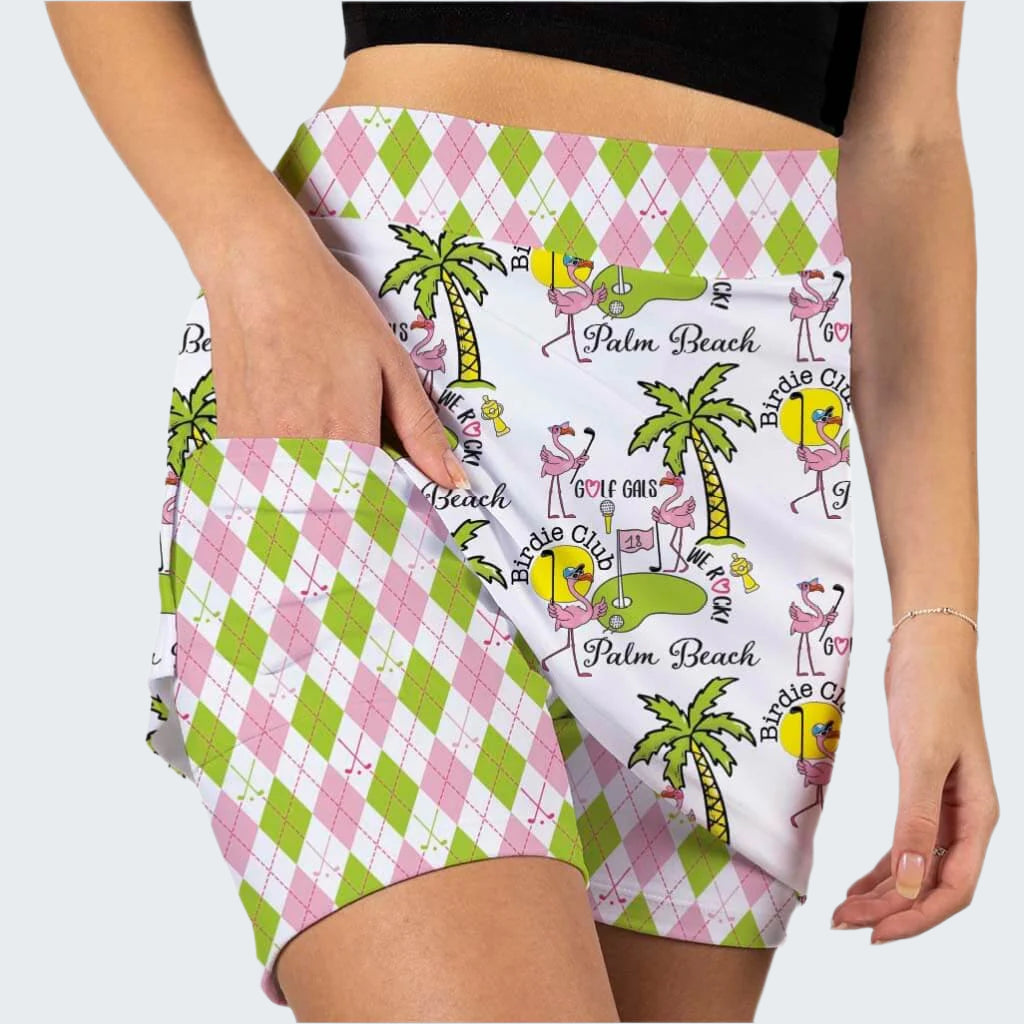 Shorts with a palm tree and argyle pattern on a white background