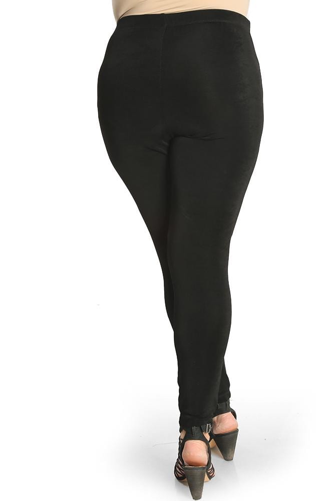 Black leggings worn by a person on a white background
