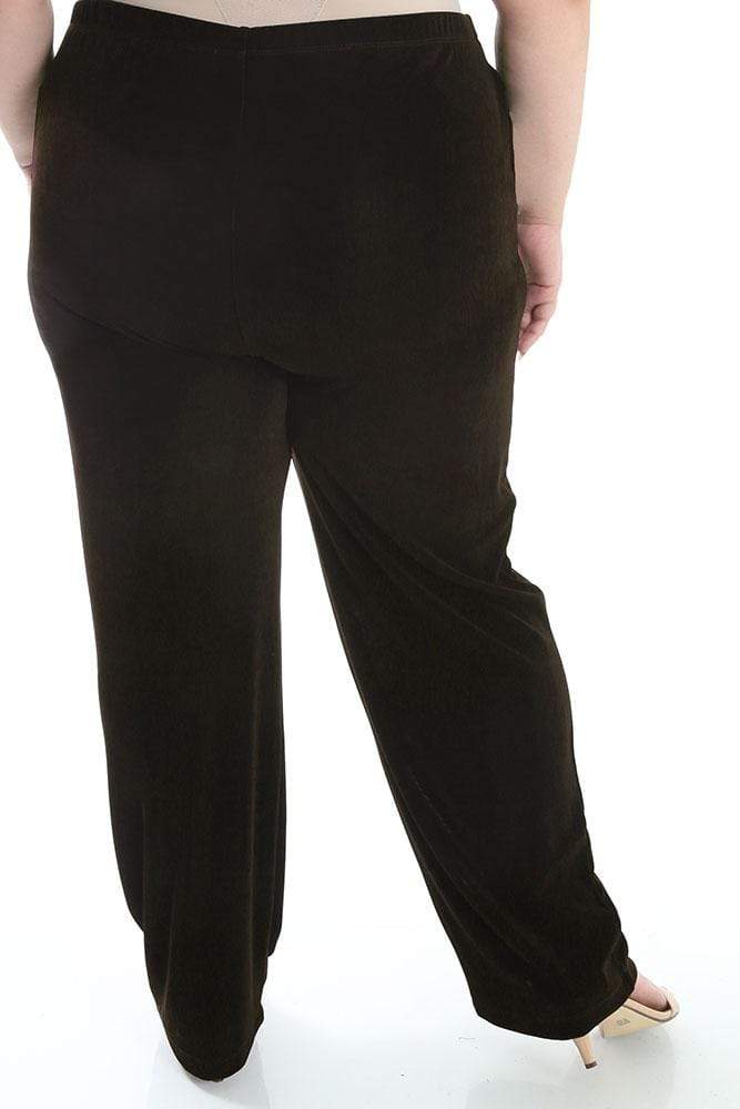 Brown pants worn by a person on a white background