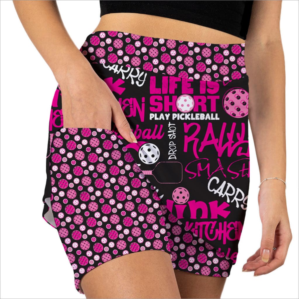 Shorts with pickleball-themed design and text on a white background