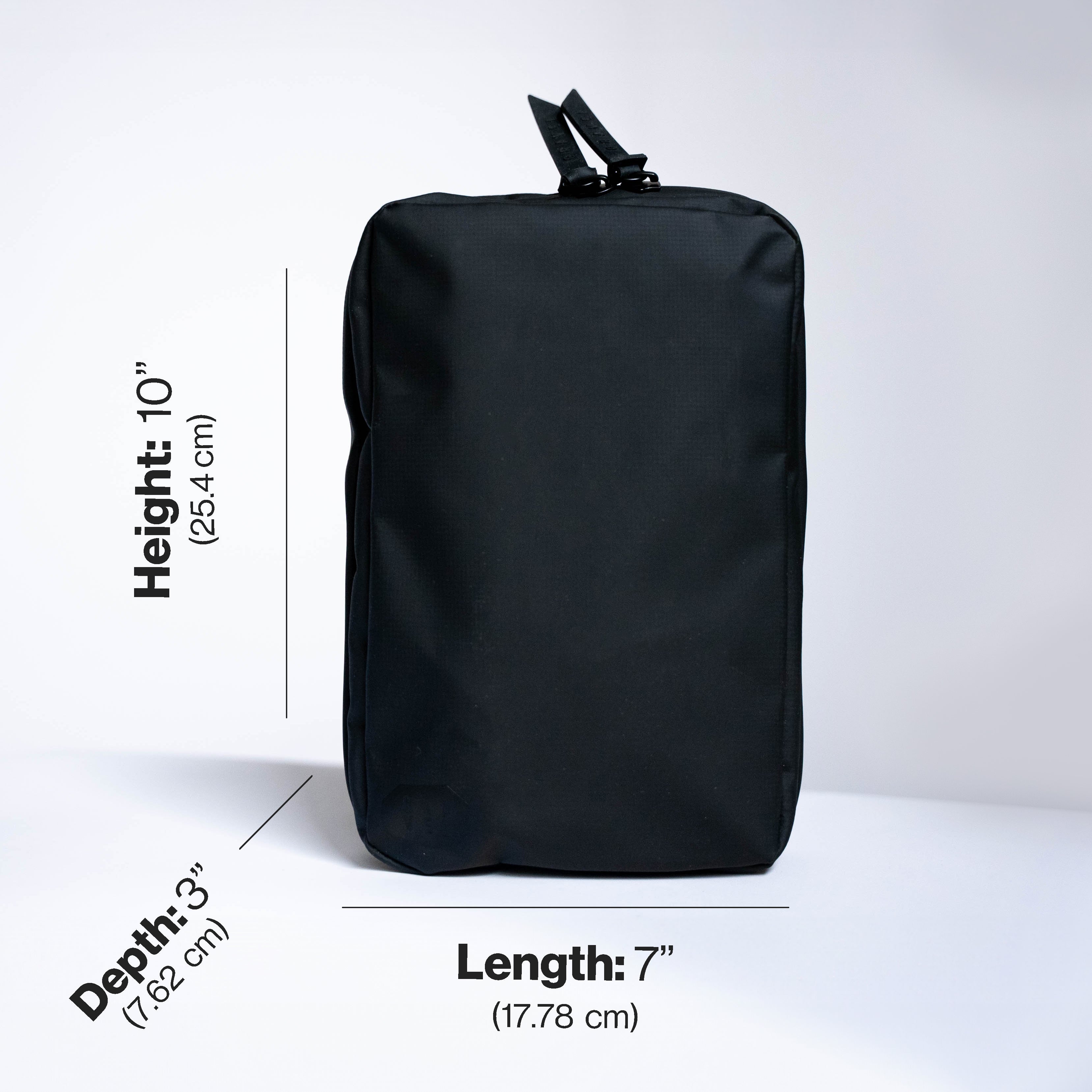 Black backpack with measurements on a white background