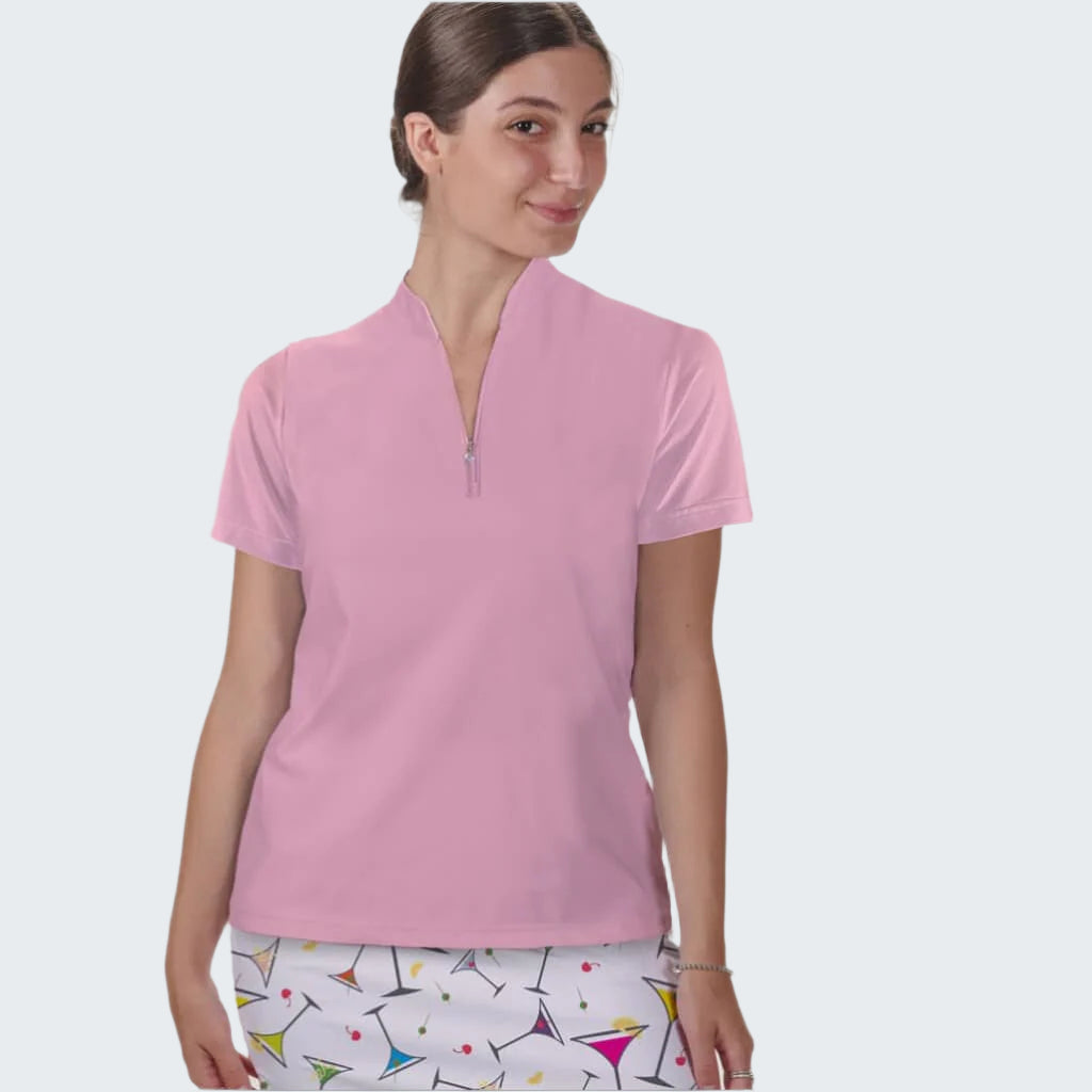 Woman wearing a pink short-sleeve shirt with a white background