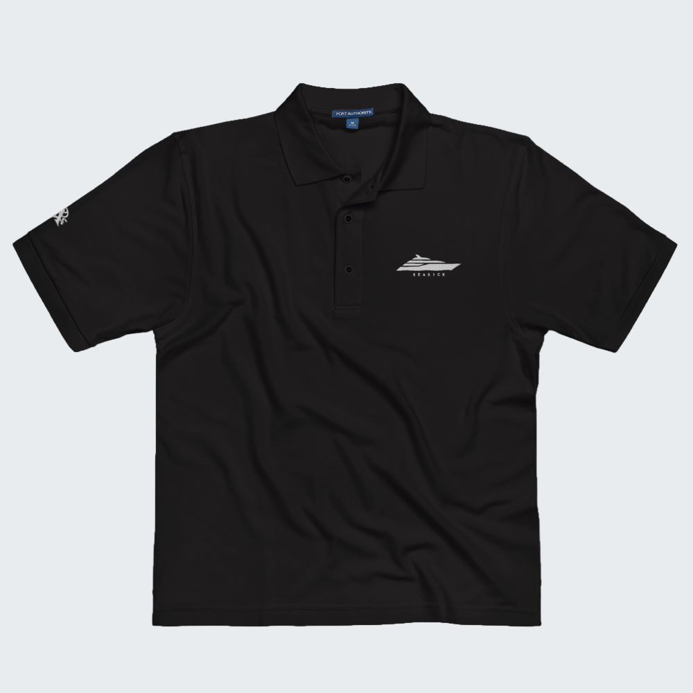 Black polo shirt with a logo on a white background