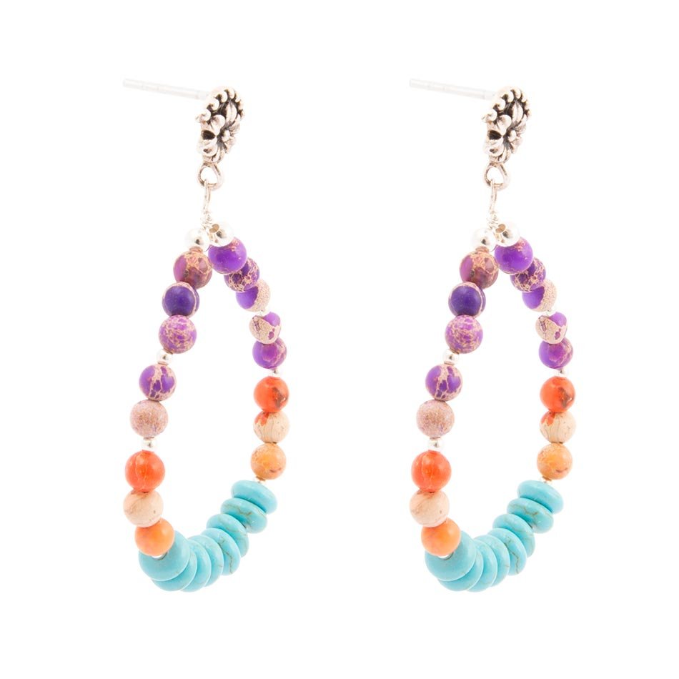 Colorful beaded hoop earrings on a white background