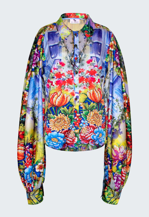 Colorful floral blouse on a white background