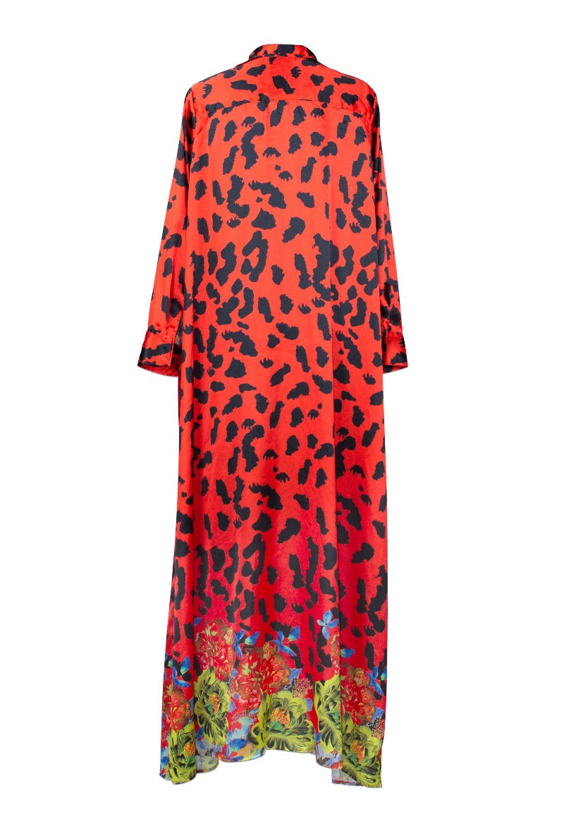 Red dress with black leopard print and colorful floral bottom on a white background