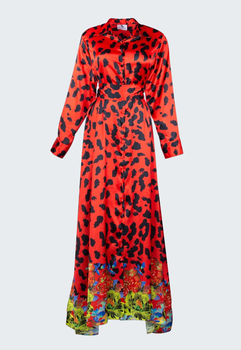 Red dress with black leopard print and colorful floral bottom on a white background