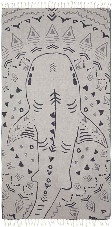 Towel with shark design and geometric patterns on a white background