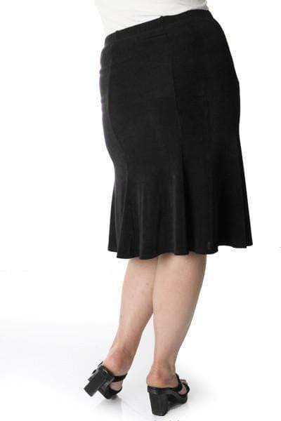 Black skirt worn by a person on a white background