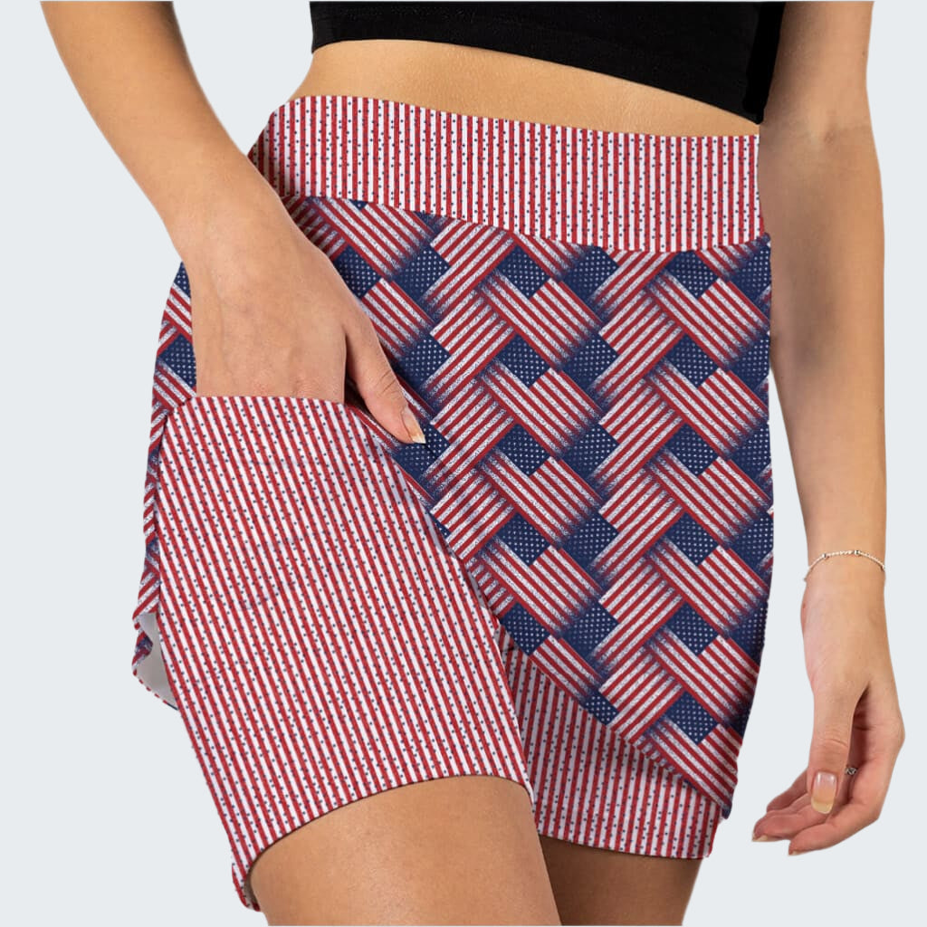 Red and white checkered shorts with a patterned waistband on a white background