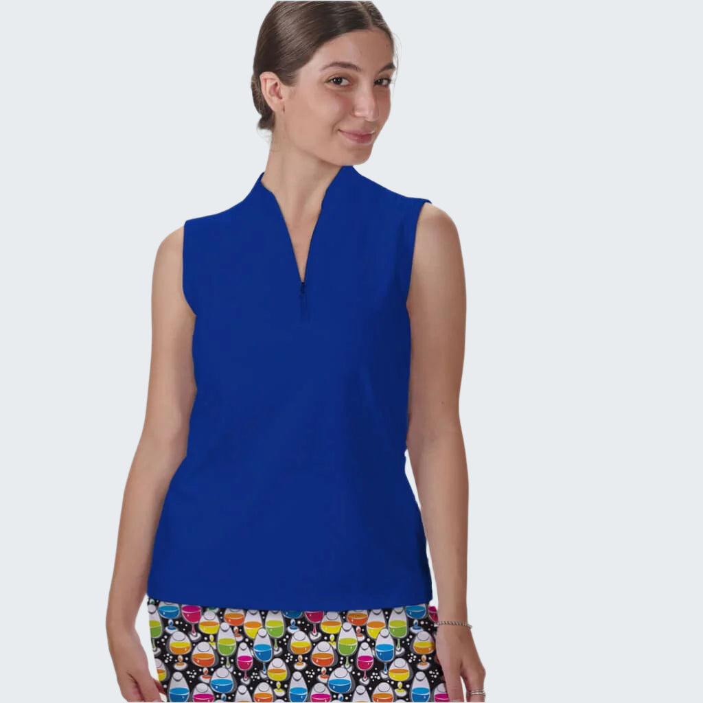 Woman wearing a blue sleeveless top with a colorful skirt on a white background