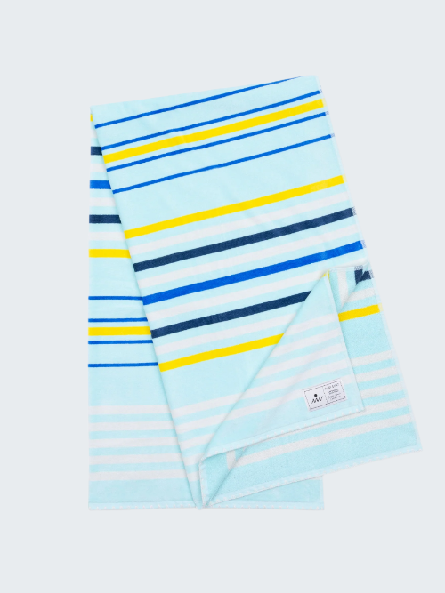 Two striped beach towels with blue, yellow, and white colors on a white background.