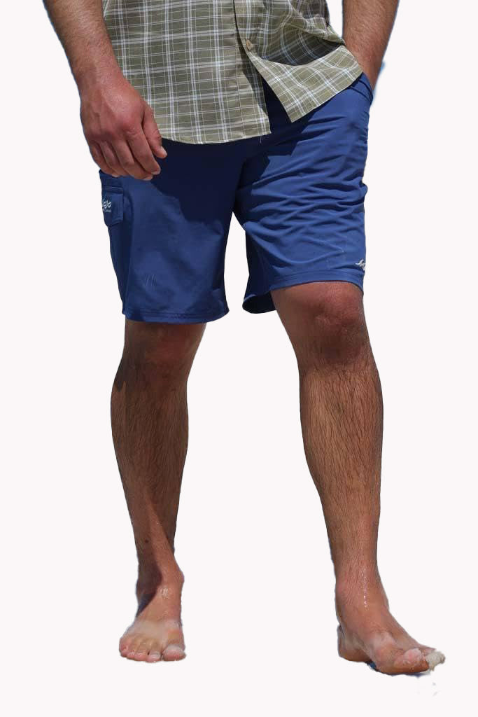 Person wearing blue shorts on a white background