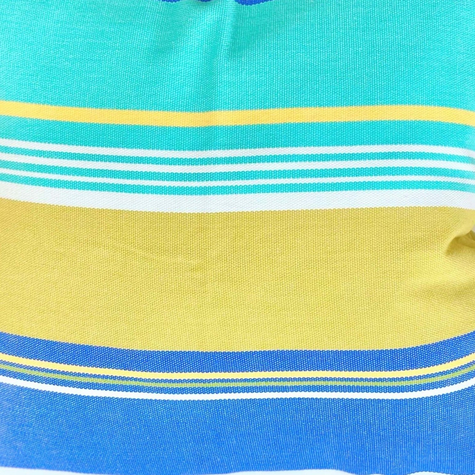 Close-up of a fabric with blue, yellow, and white stripes.