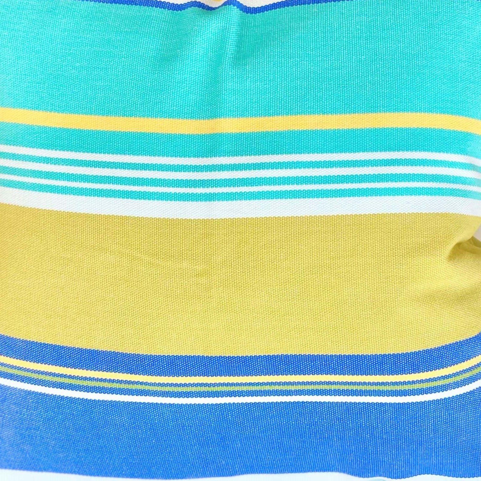 Close-up of a fabric with blue, yellow, and white stripes.
