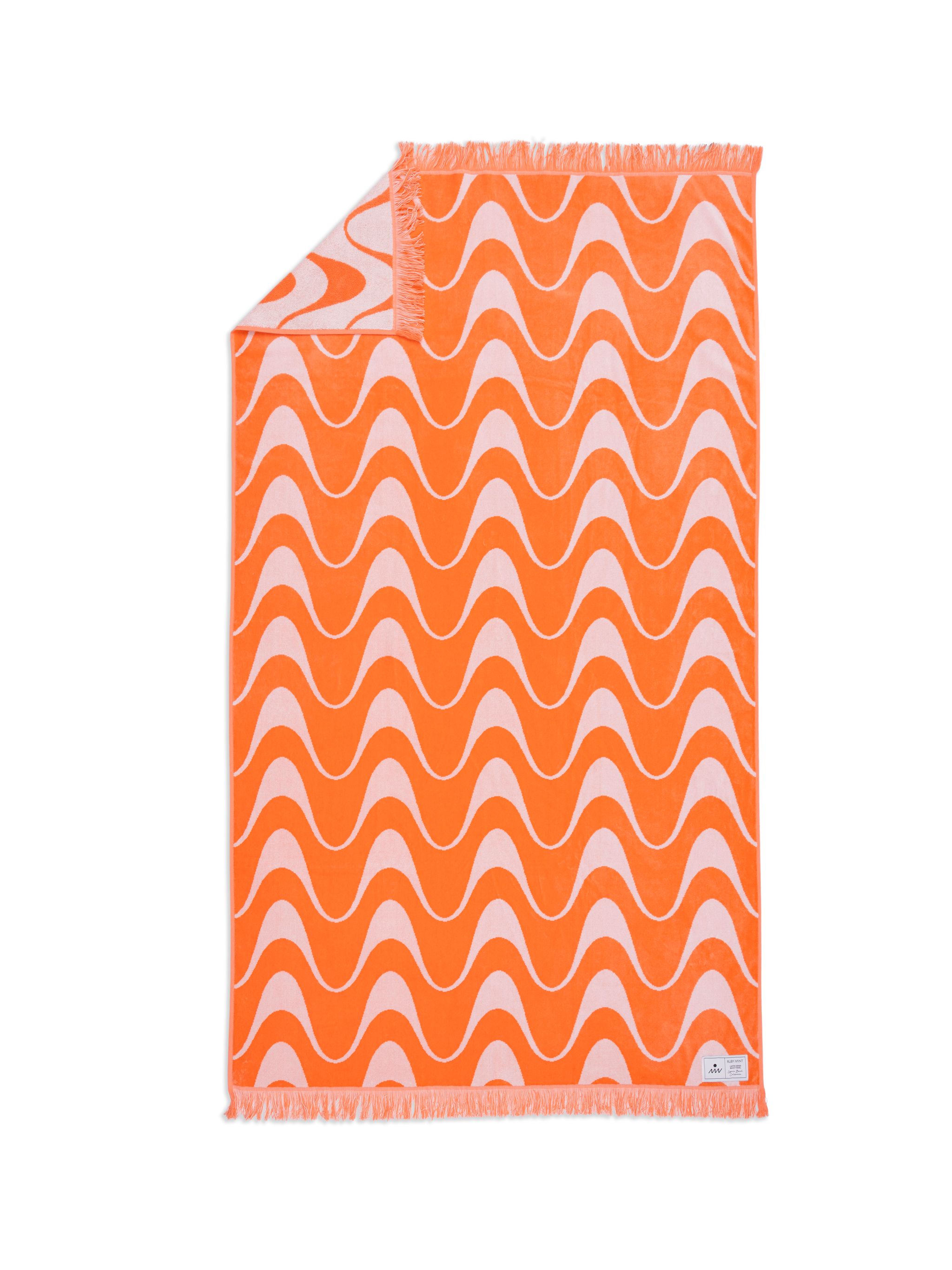 Orange towel with white wavy pattern on a white background