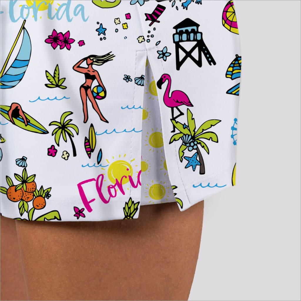 Colorful beach-themed fabric with graphics on a white background