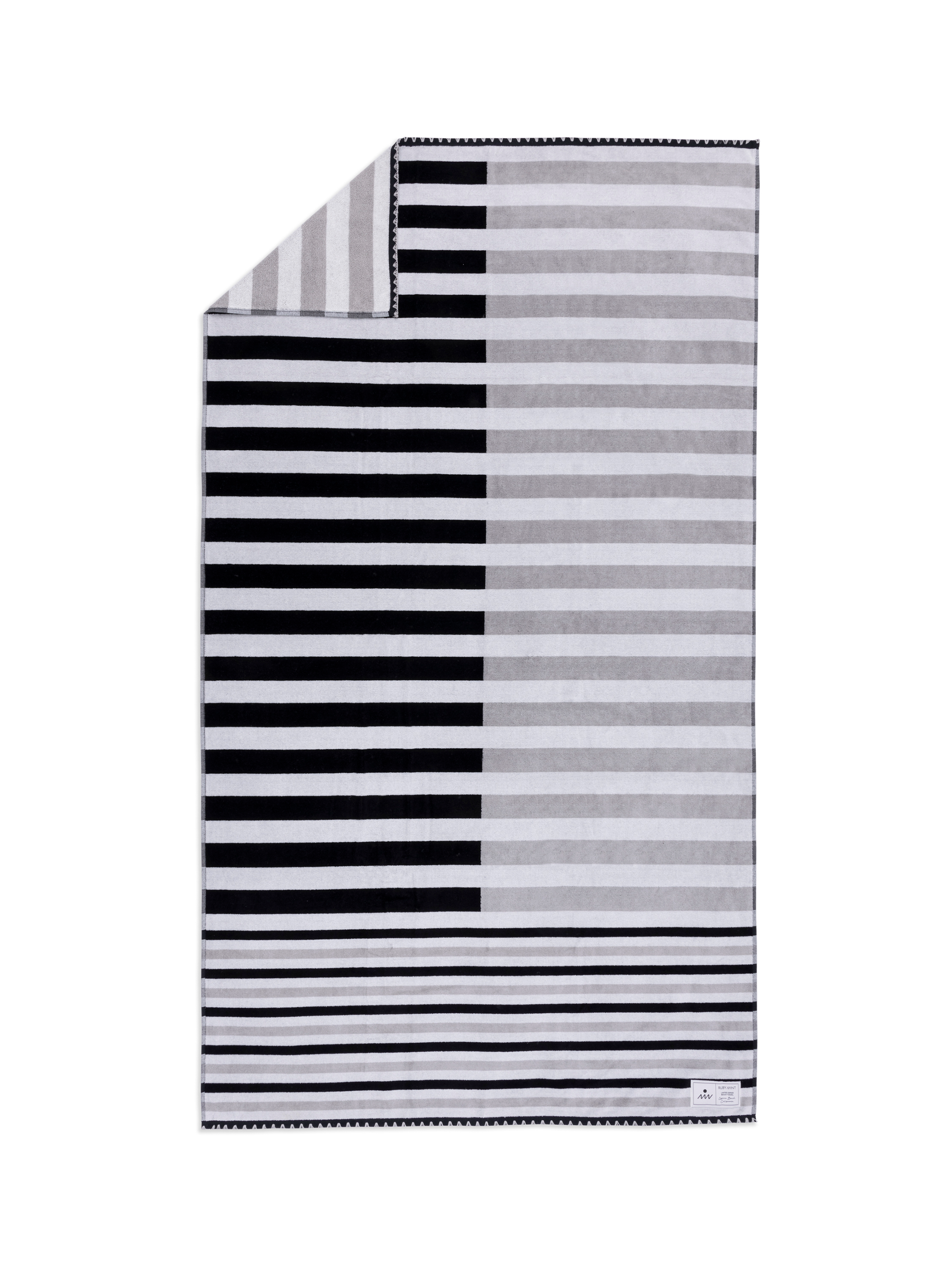 Striped black and white towel on a white background