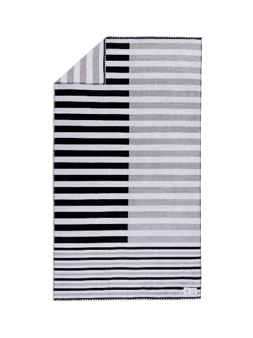 Striped black and white towel on a white background
