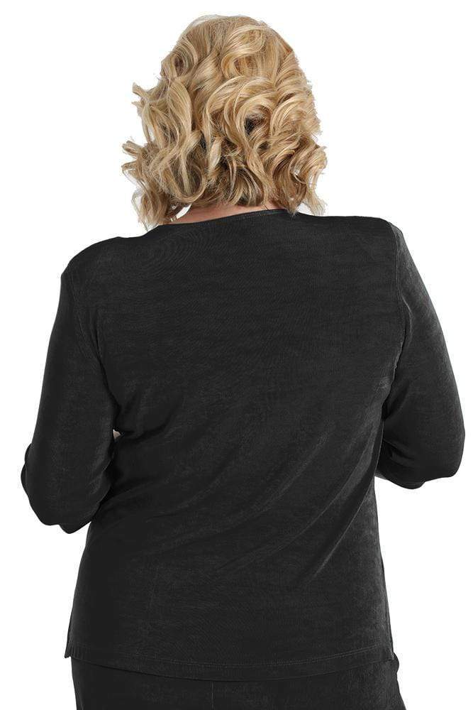 Person wearing a black outfit with a plain background