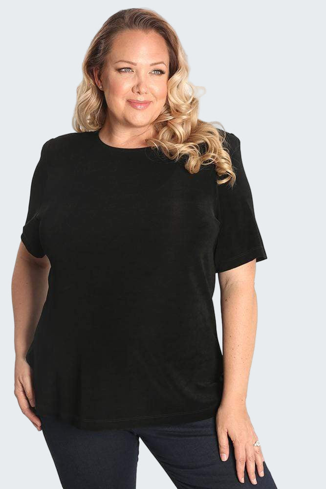 Woman wearing a black t-shirt against a white background