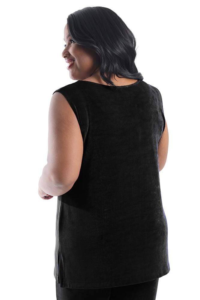 Woman wearing a black sleeveless top on a white background