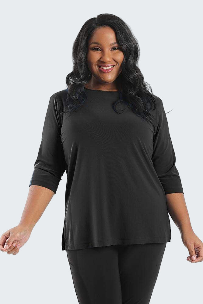 Woman wearing a black outfit on a white background