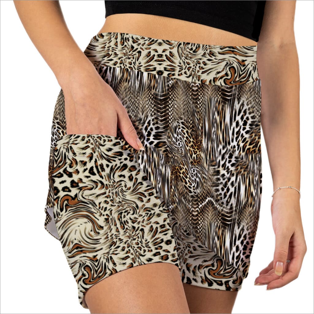 Animal print shorts worn by a person on a white background