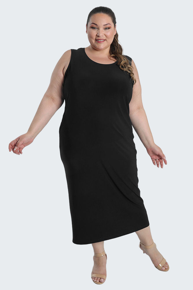 Woman wearing a black sleeveless dress on a white background