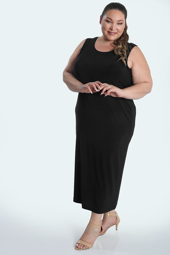 Woman wearing a black sleeveless dress on a white background