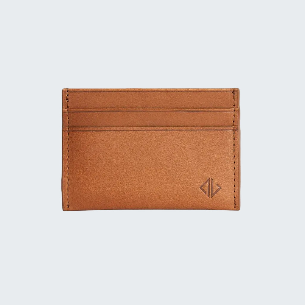 Brown leather cardholder with a visible brand logo on a white background