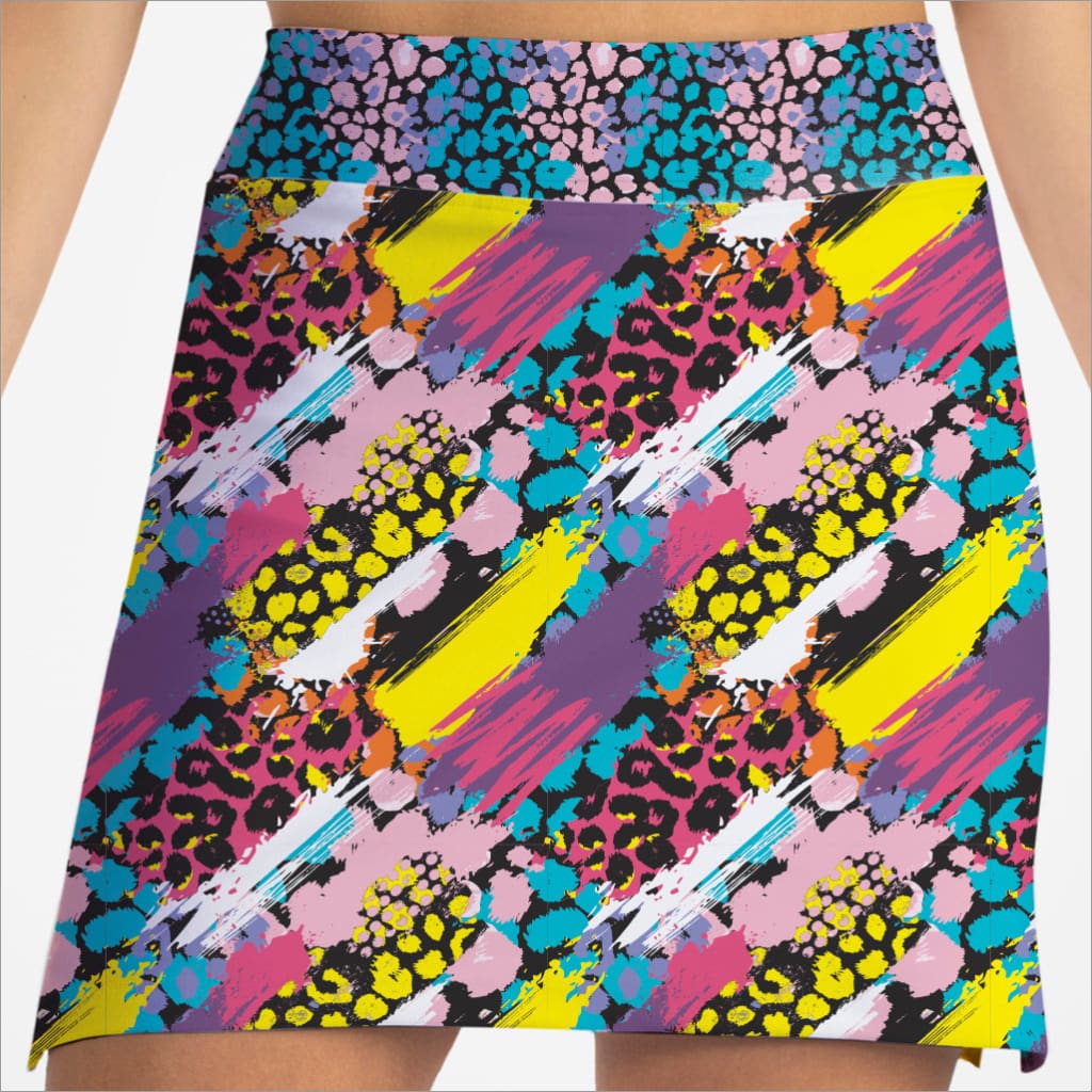 Colorful patterned skirt with abstract design on a plain background