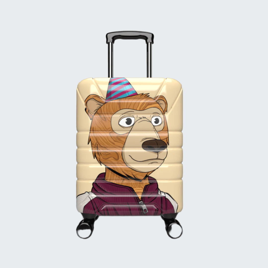 Suitcase with a cartoon bear design wearing a party hat on a dark background