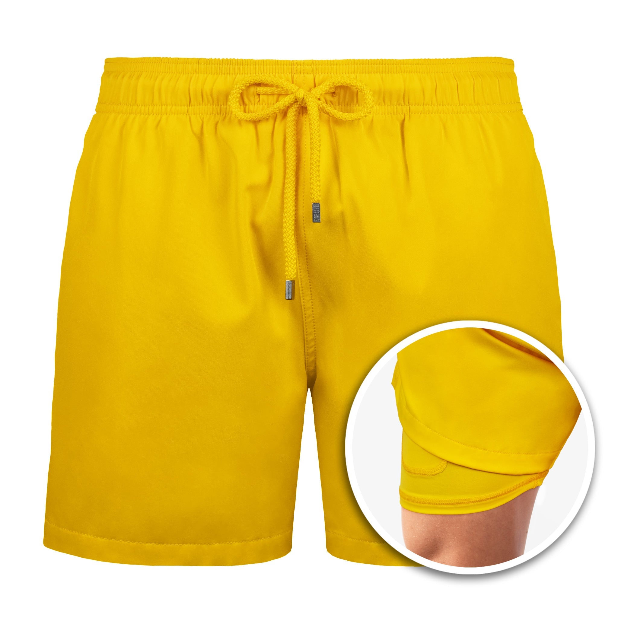 Yellow shorts with a close-up inset on a white background