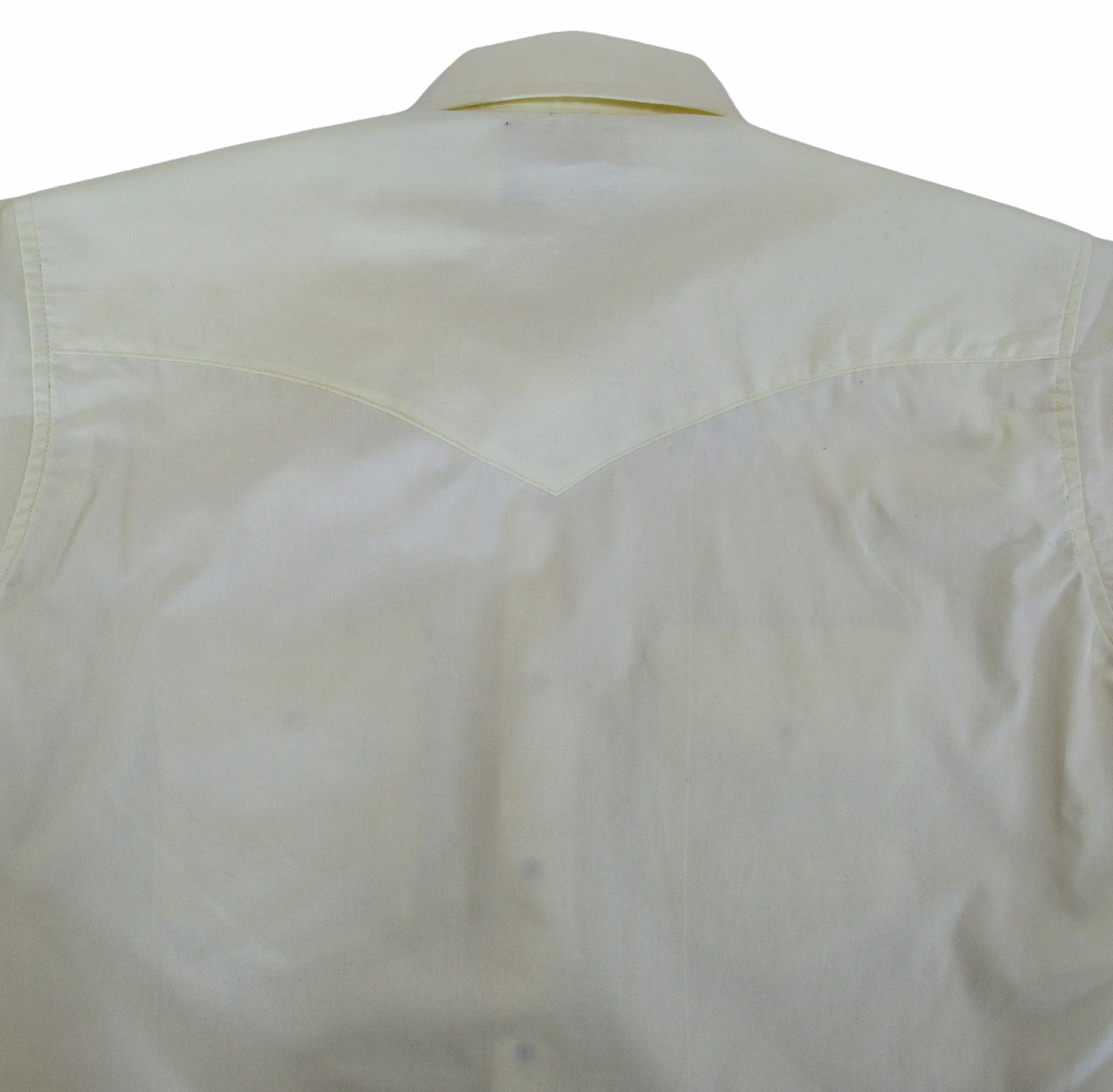 Beige shirt on a white background