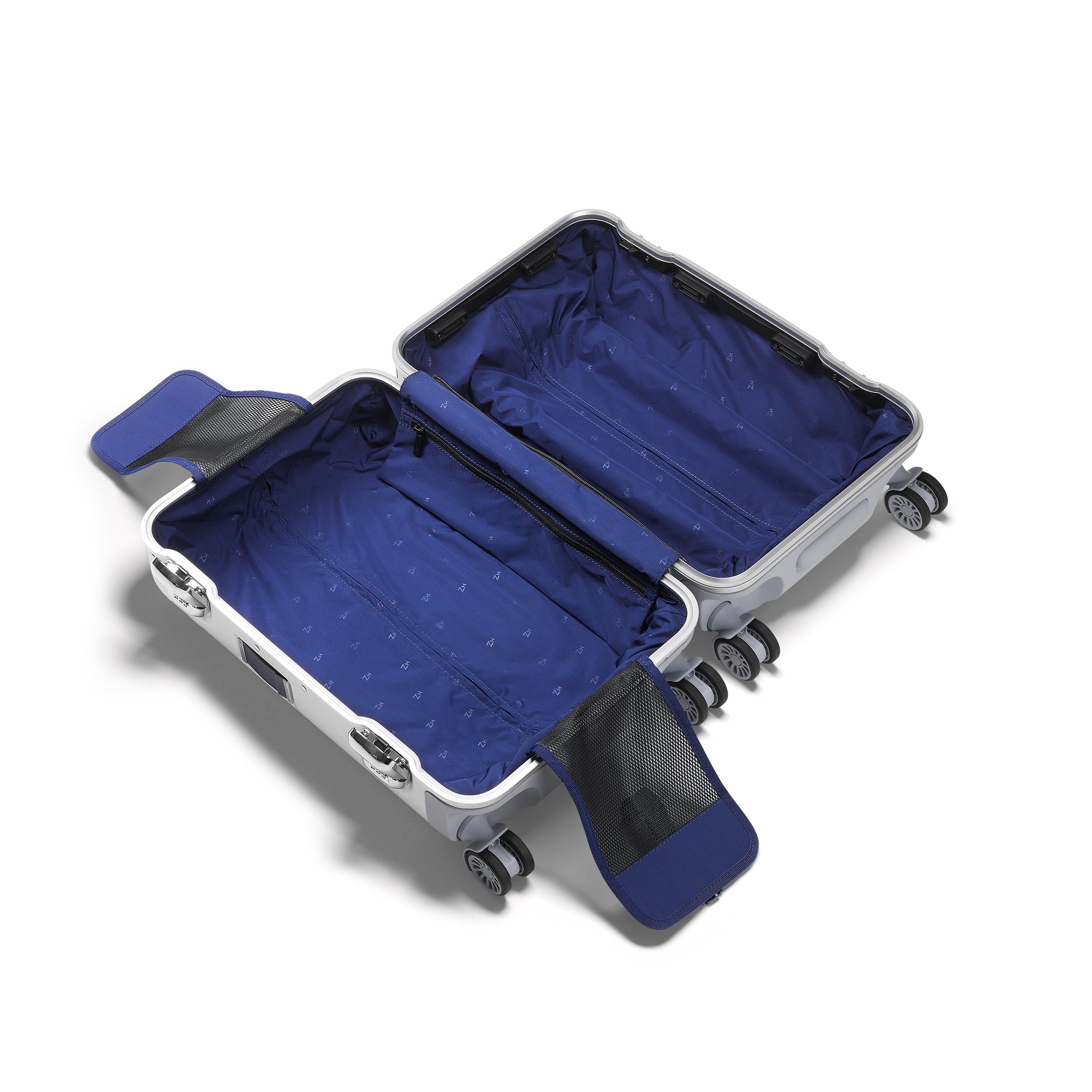 Open suitcase with blue interior on a white background