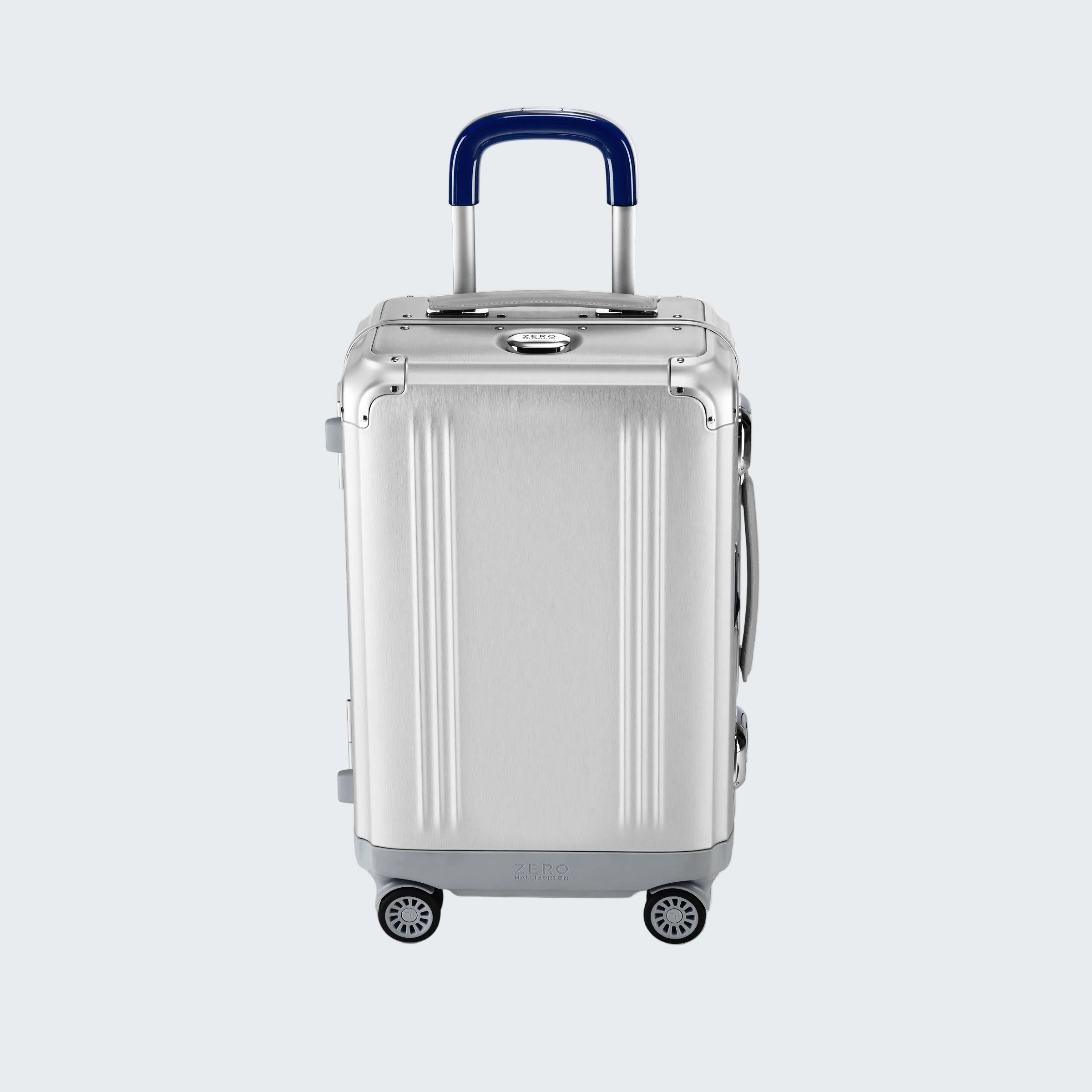 Silver suitcase with a blue handle on a white background