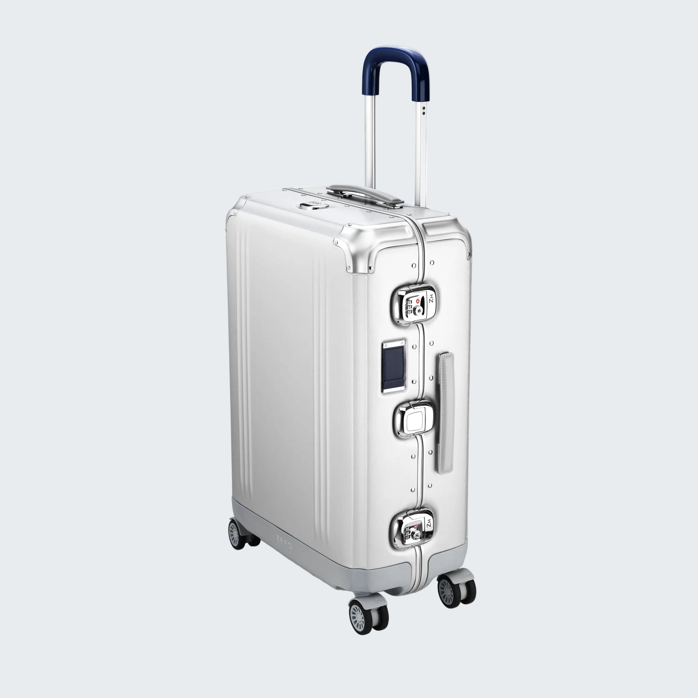 Silver suitcase with a blue handle on a white background