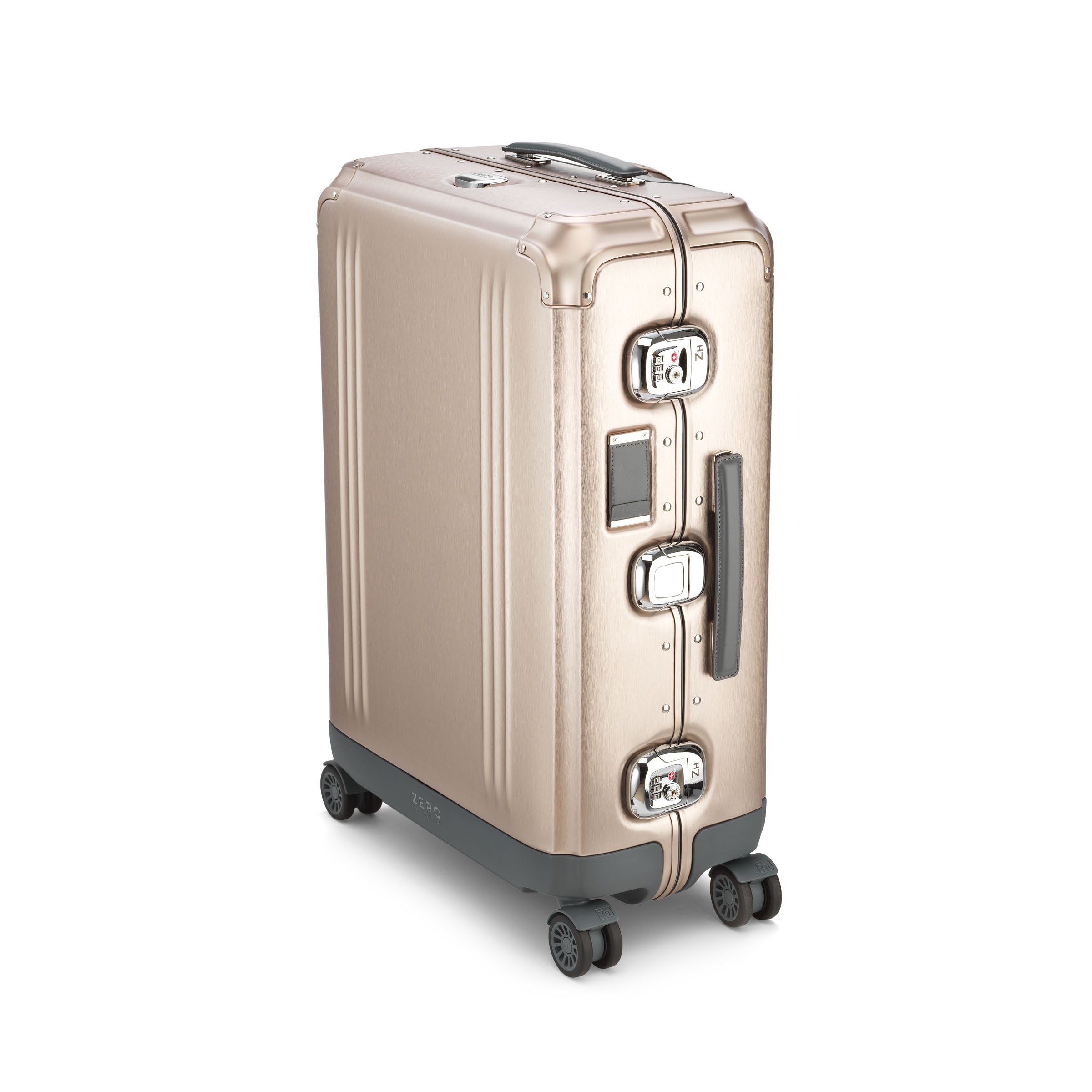 Gold suitcase with wheels on a white background