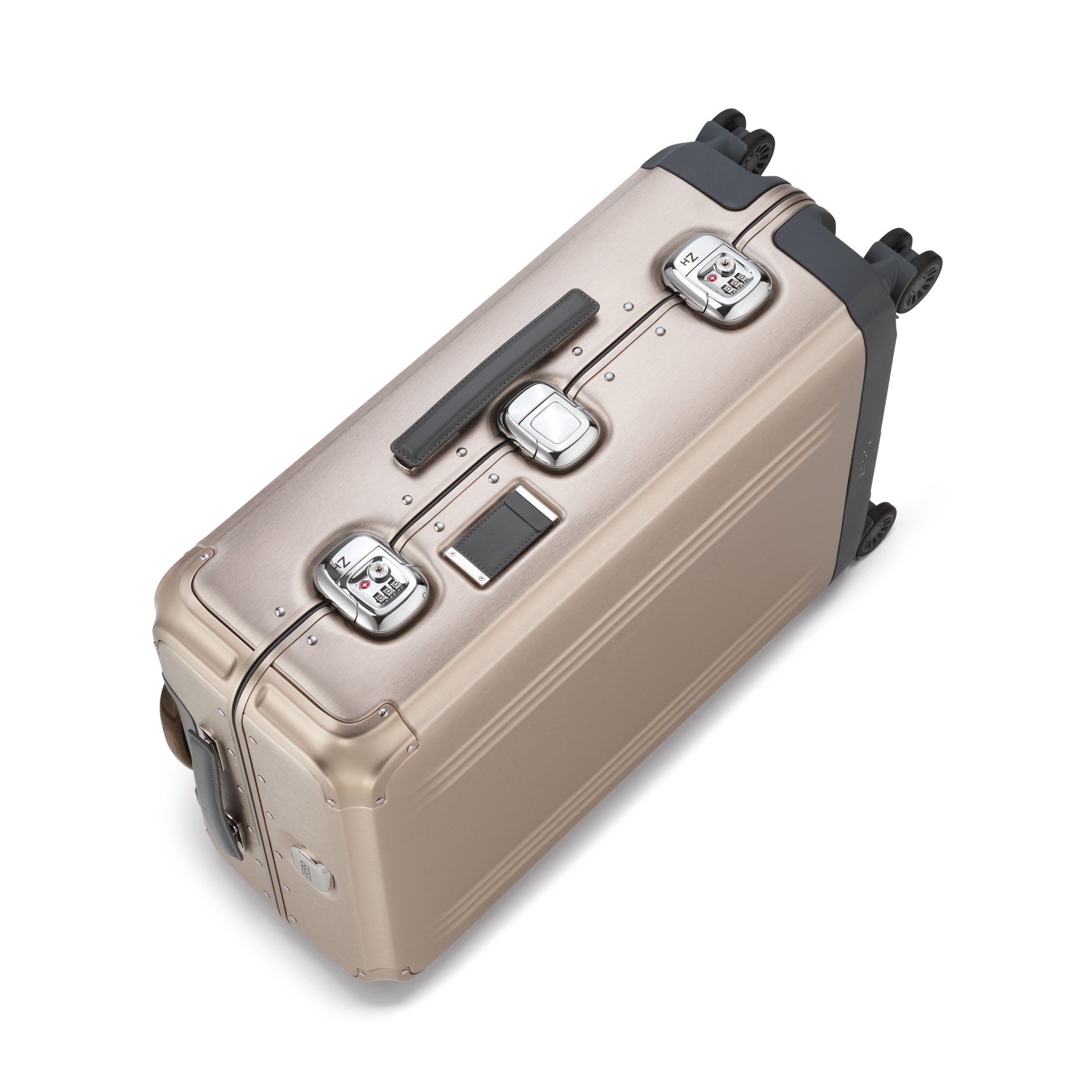 Beige suitcase with silver latches on a white background