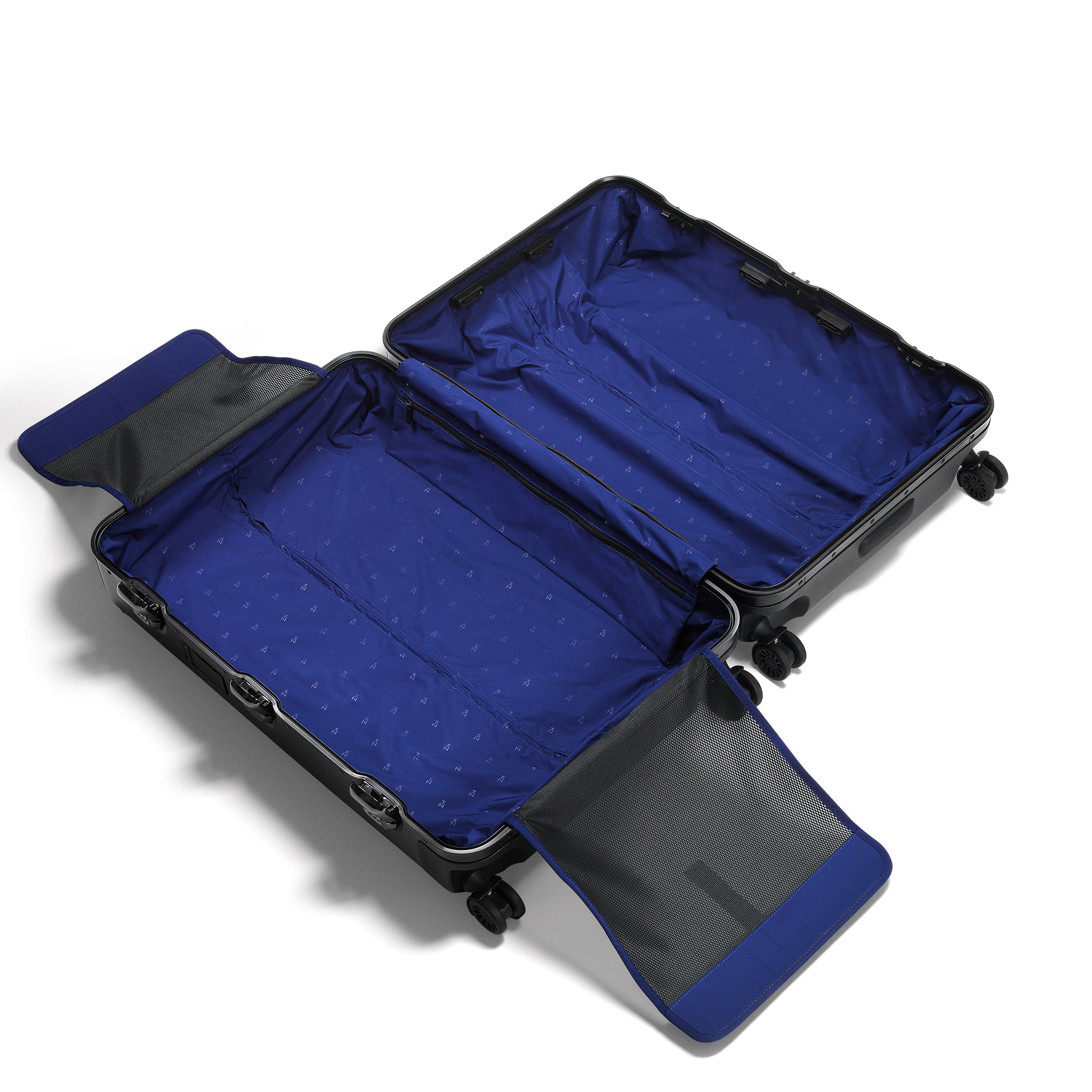 Open black suitcase with blue interior on a white background