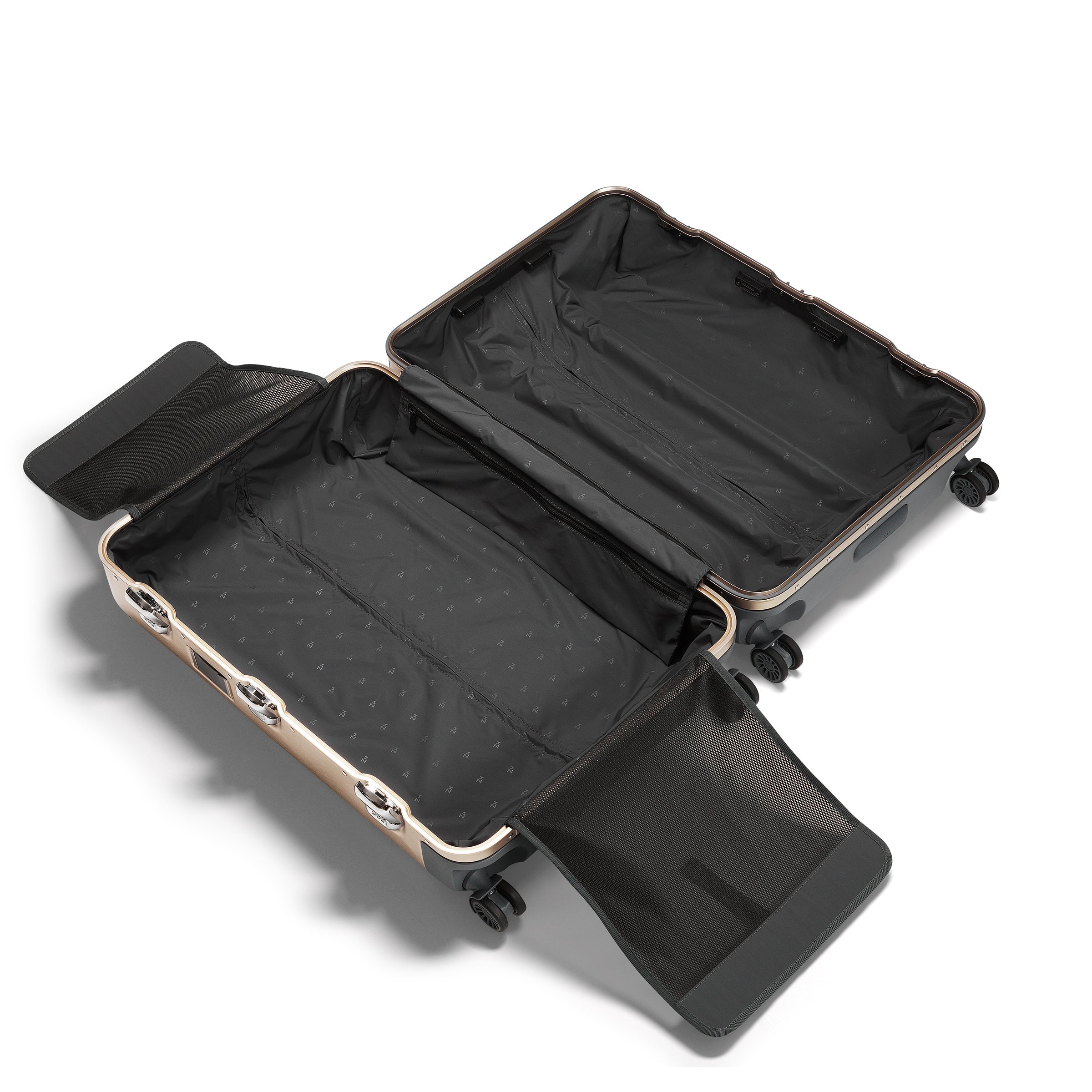 Open suitcase with black interior on a white background