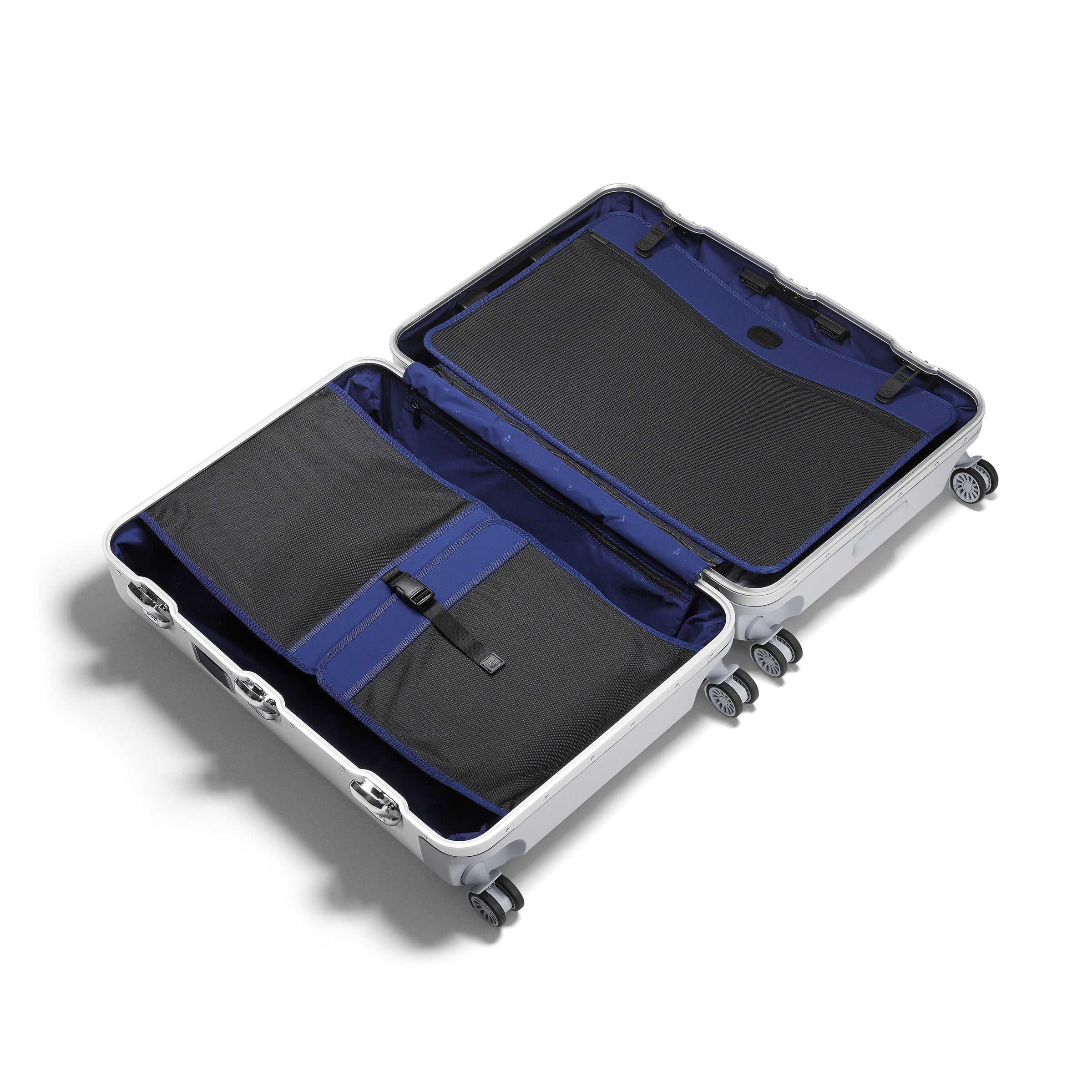 Open suitcase with blue interior on a white background