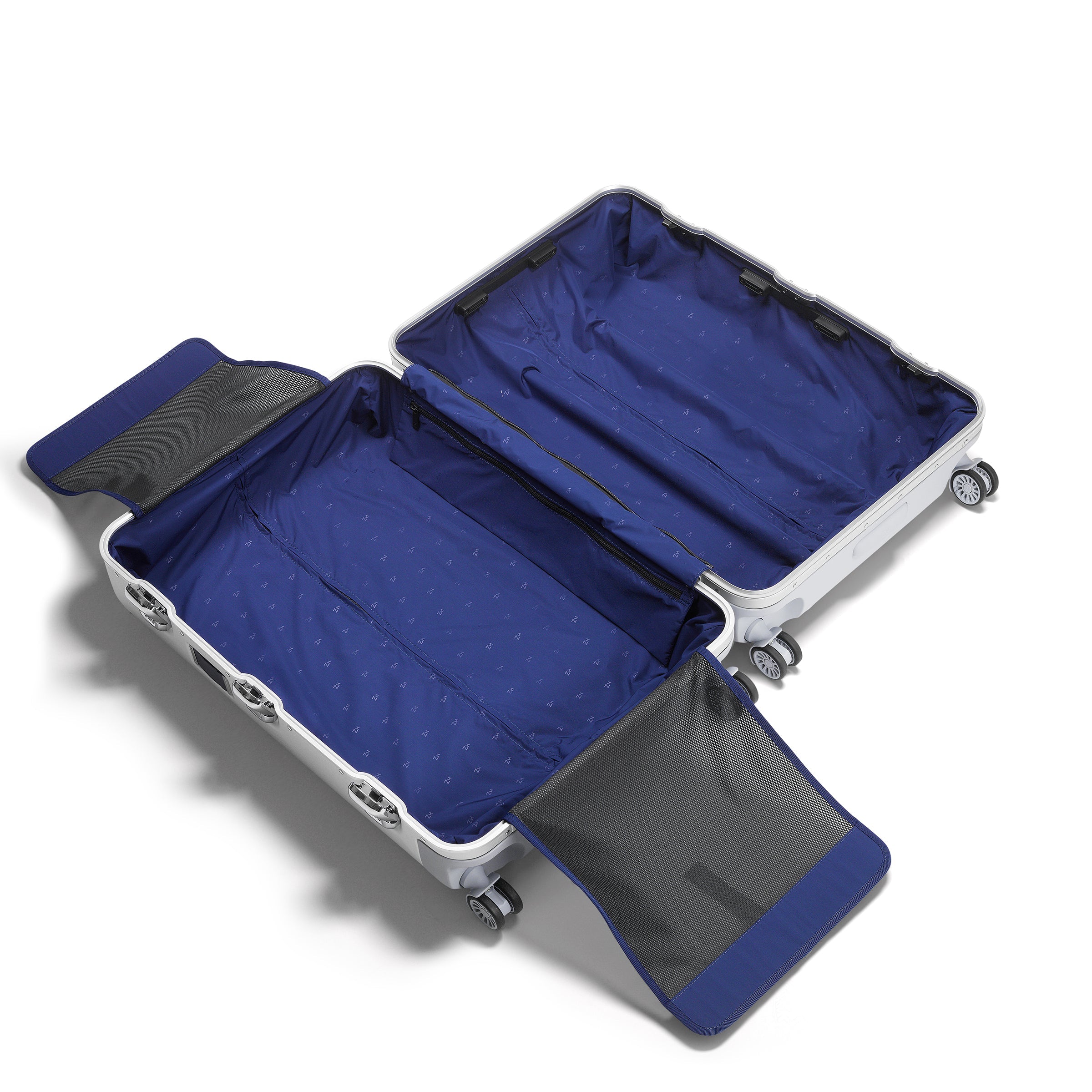 Open blue suitcase with white interior on a white background