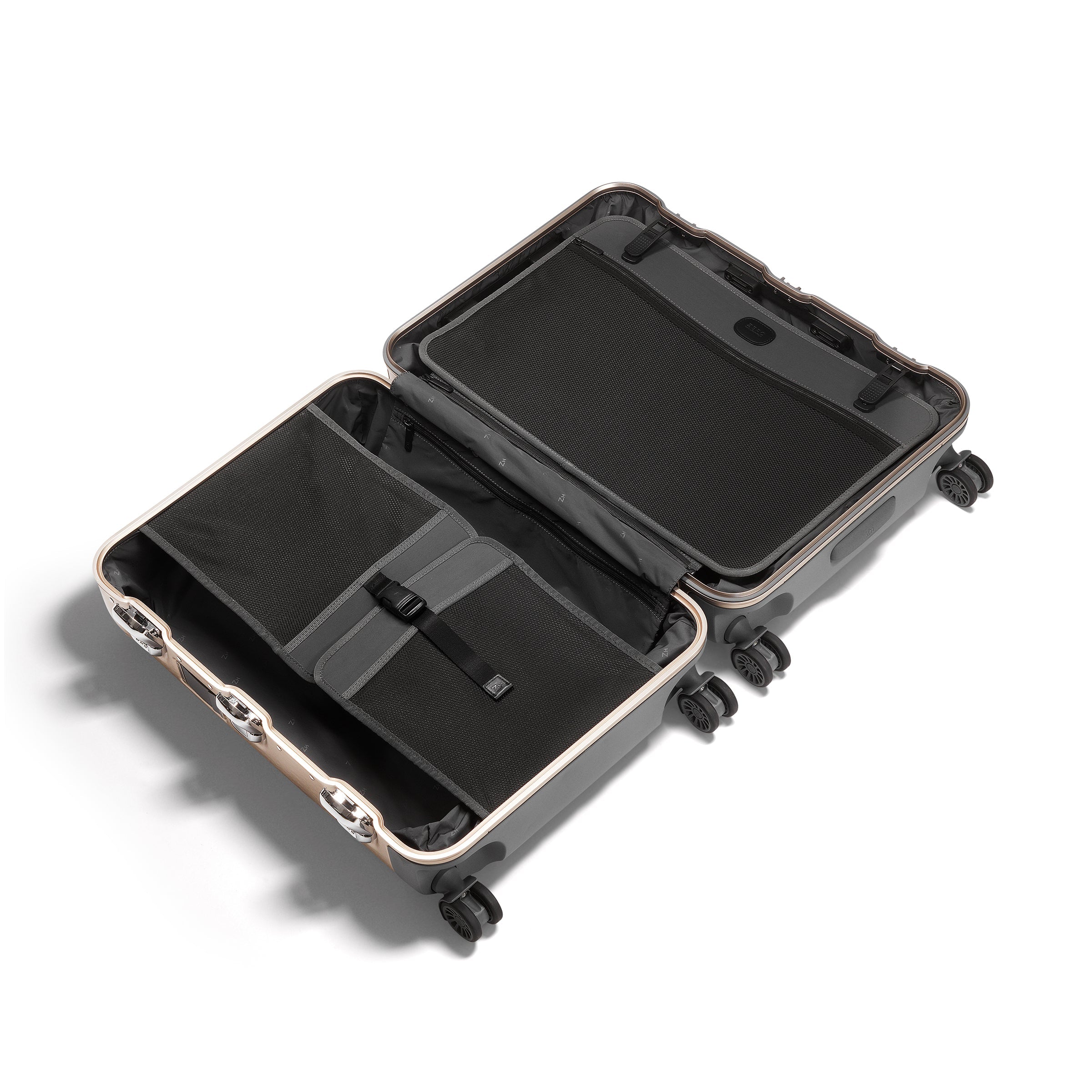 Black hard-shell travel case with open lid on a white background