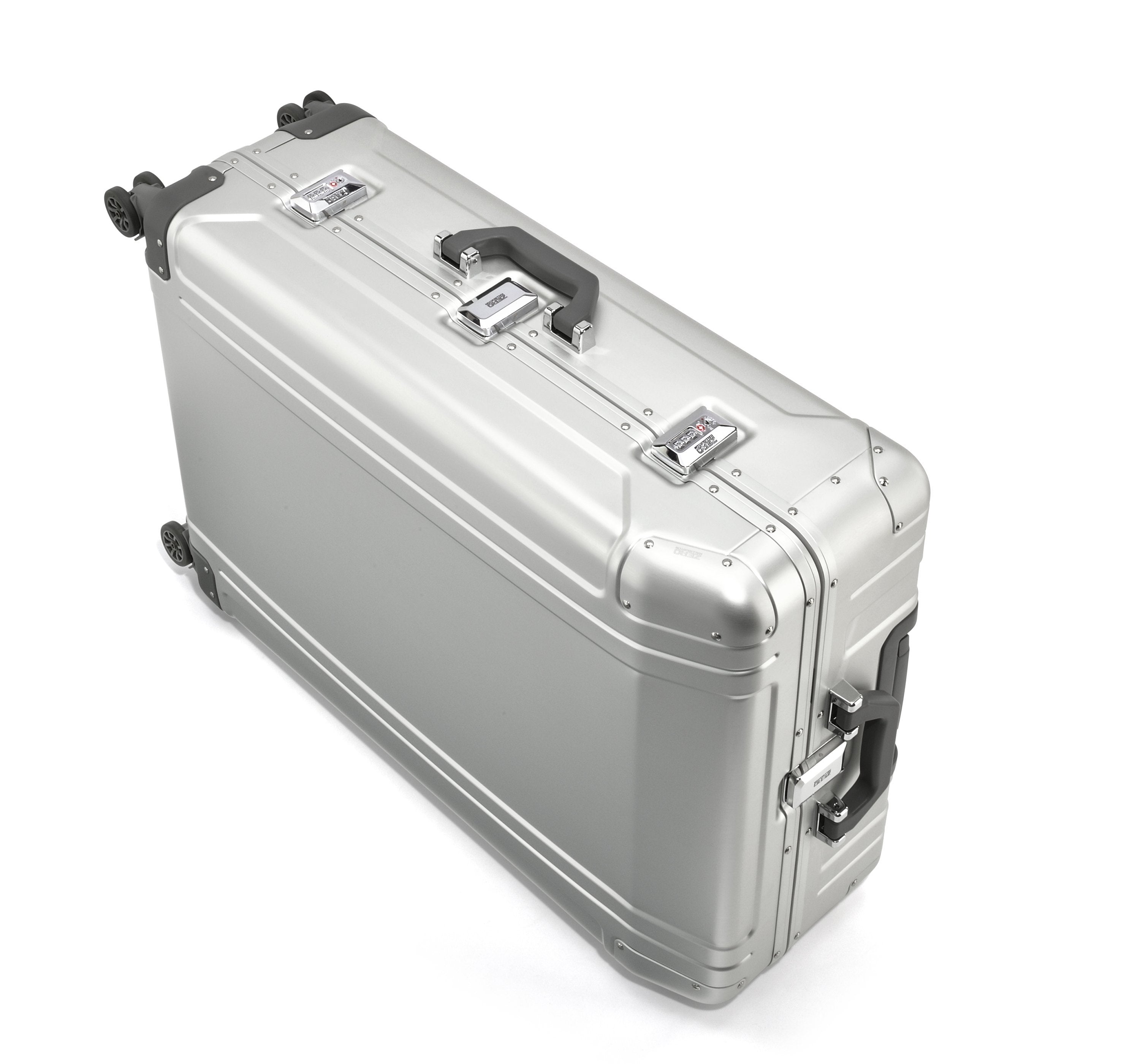 Silver suitcase with wheels on a white background