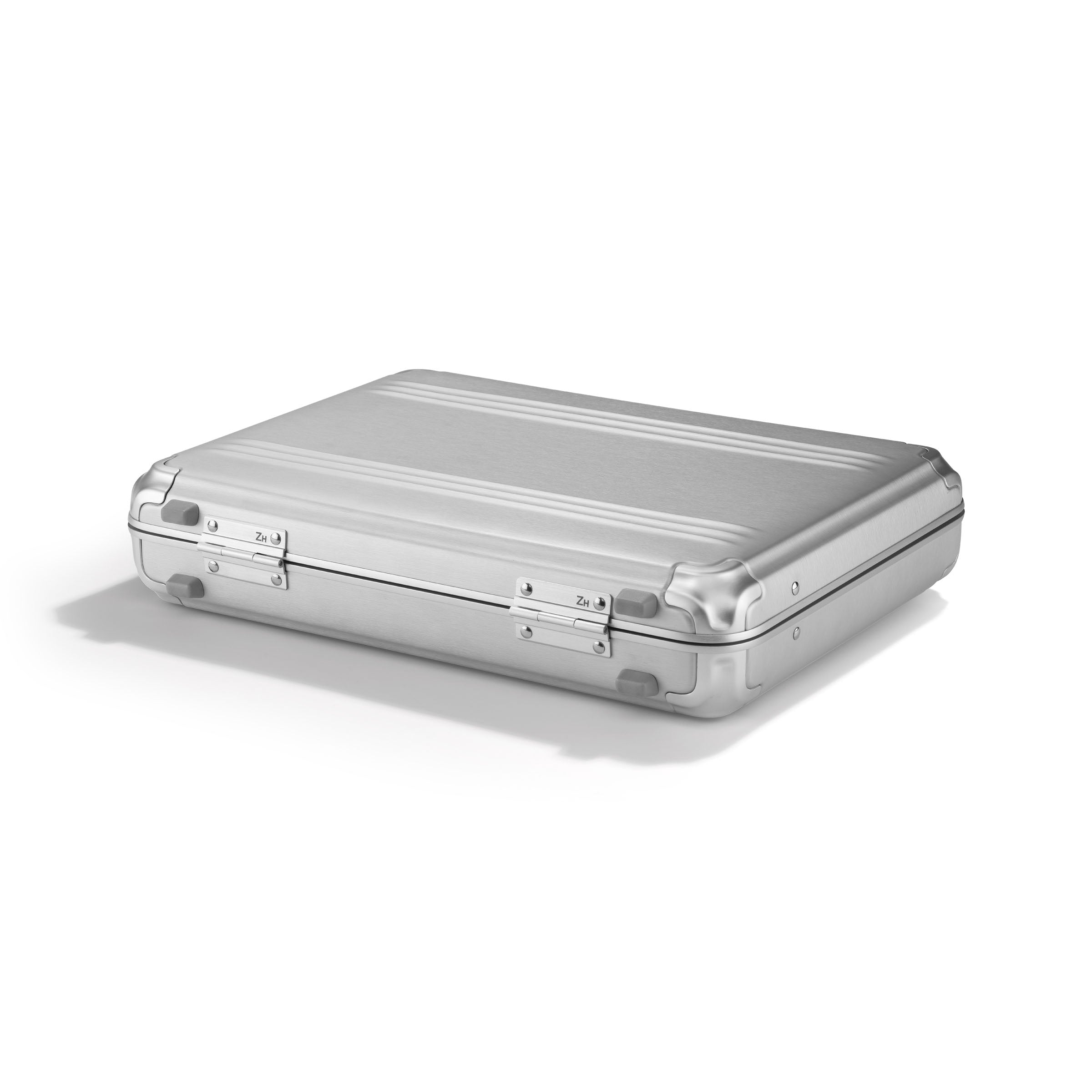 Silver suitcase on a white background