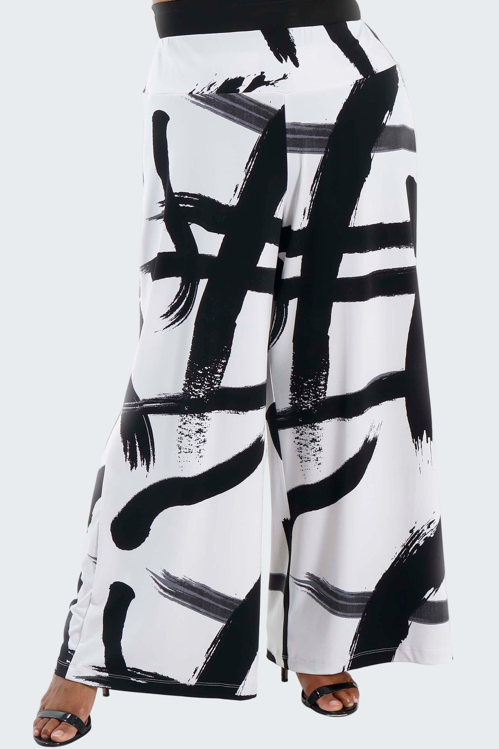 Black and white abstract patterned pants on a white background